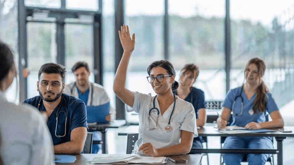 A group of medical school students studying during their surgery rotation.
